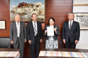 審査結果報告書手交